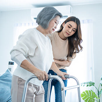 Woman helping grandmother